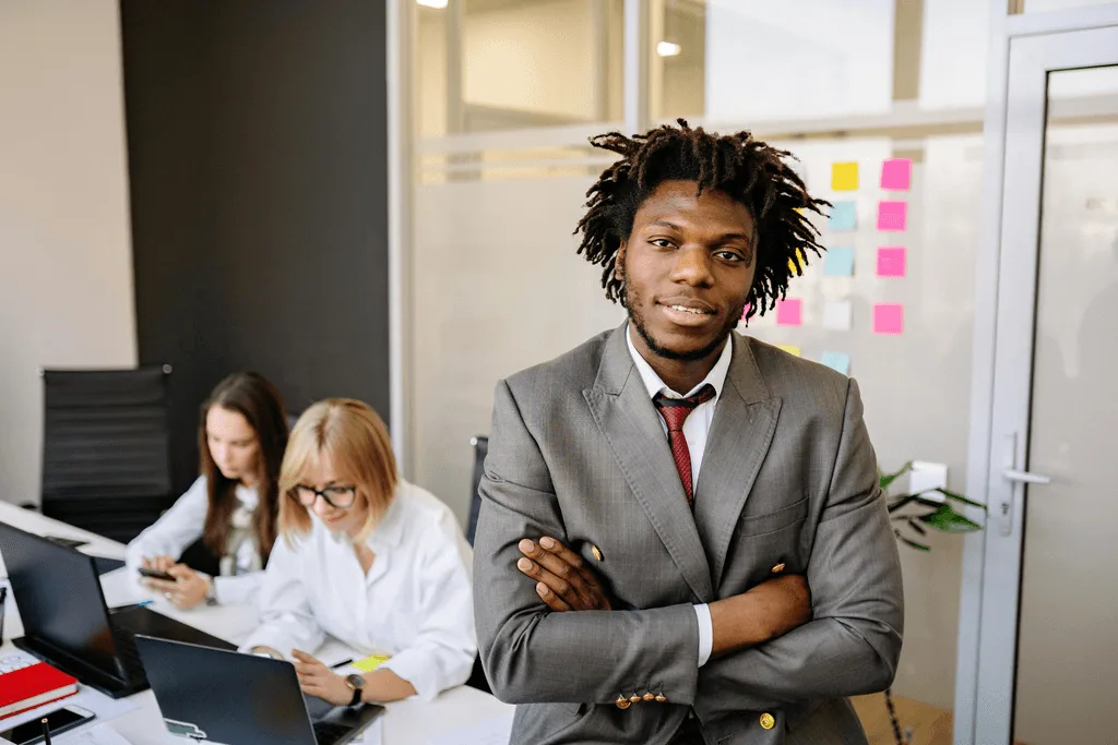 A Chief Learning Officer in a modern executive office, considering the organization's high-level L&D strategy.